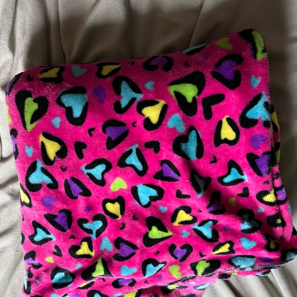 pink throw blanket with hearts